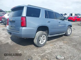 2016 Chevrolet Tahoe LT with VIN 1GNSCBKC2GR257077, listed as a IAAI auction lot 42091171 with 118,660 mi miles and . Bid and sale history available at DreamBid. Image 4.