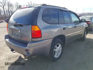 2008 GMC Envoy SLE2 with VIN 1GKDT13S782210241, listed as a IAAI auction lot 41635443 with 171,816 mi miles. Bid and sale history available at carsss.com. Image 4.