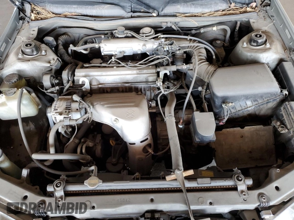 2001 Toyota Camry CE z VIN 4T1BG22K11U017054, wystawiony jako Copart lot #57623485 z przebiegiem 242 217 mil mil oraz Szkoda całkowita • Salvage title. Historia ofert i sprzedaży dostępna na DreamBid. Obrazek 11.
