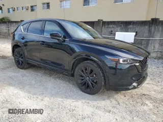 2022 Mazda CX-5 2.5 Turbo with VIN JM3KFBAY8N0619340, listed as a Copart auction lot 46217955 with 13,604 mi miles and Salvage Title. Bid and sale history available at carsss.com. Image 4.