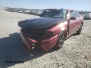 1998 Toyota Camry LE z VIN JT2BF22K6W0137396, wystawiony jako Copart lot #49592845 z przebiegiem Nie podano mil oraz Szkoda całkowita • Salvage title. Historia ofert i sprzedaży dostępna na DreamBid. Obrazek 1.