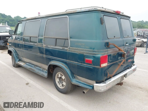 1994 GMC Vandura z VIN 1GDEG25K2RF523677, wystawiony jako IAAI lot #42500077 z przebiegiem 184 965 mil mil oraz . Historia ofert i sprzedaży dostępna na DreamBid. Obrazek 3.