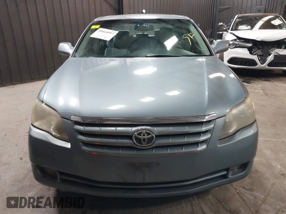 2007 Toyota Avalon XL z VIN 4T1BK36B17U189303, wystawiony jako IAAI lot #41614917 z przebiegiem 238 114 mil mil oraz . Historia ofert i sprzedaży dostępna na DreamBid. Obrazek 12.
