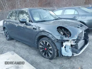 2016 MINI Cooper Hardtop 4 Door S with VIN WMWXU3C56G2B63682, listed as a IAAI auction lot 41244676 with 110,902 mi miles. Bid and sale history available at carsss.com. Image 14.