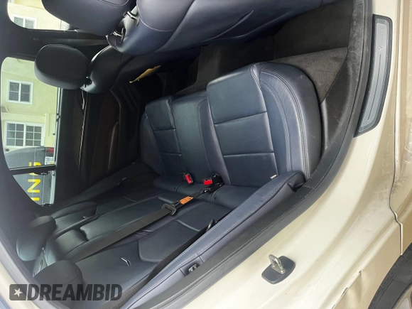 2014 Cadillac CTS Vsport Premium RWD z VIN 1G6AV5S87E0163180, wystawiony jako Copart lot #88171835 z przebiegiem 156 789 mil mil oraz Szkoda całkowita • Salvage title. Historia ofert i sprzedaży dostępna na DreamBid. Obrazek 6.