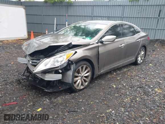 2012 Hyundai Azera with VIN KMHFH4JGXCA152917, listed as a IAAI auction lot 42278803 with 98,890 mi miles and . Bid and sale history available at DreamBid. Image 2.