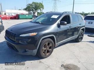 2016 Jeep Cherokee Latitude with VIN 1C4PJMCB3GW197446, listed as a IAAI auction lot 42087393 with 94,281 mi miles and . Bid and sale history available at carsss.com. Image 2.