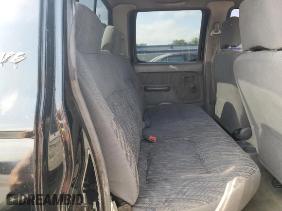 2000 Nissan Frontier XE with VIN 1N6ED27T7YC300373, listed as a Copart auction lot 55829535 with 301,305 mi miles and Salvage title. Bid and sale history available at DreamBid. Image 10.