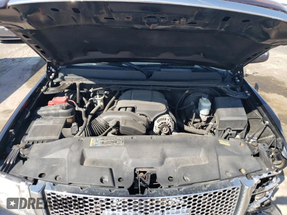 2010 GMC Sierra 1500 Denali z VIN 3GTRKXE25AG202169, wystawiony jako Copart lot #71733714 z przebiegiem 123 400 mil mil oraz Szkoda całkowita • Salvage title. Historia ofert i sprzedaży dostępna na DreamBid. Obrazek 11.