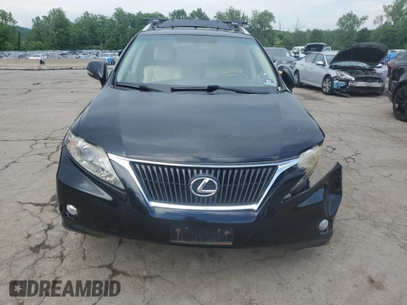 2011 Lexus RX 350 z VIN JTJBK1BA7B2015596, wystawiony jako Copart lot #61337755 z przebiegiem 80 907 mil mil oraz Szkoda całkowita • Salvage title. Historia ofert i sprzedaży dostępna na DreamBid. Obrazek 5.