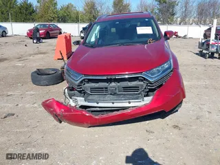 2019 Honda CR-V Touring with VIN 2HKRW1H9XKH500025, listed as a IAAI auction lot 41667564 with 73,889 mi miles. Bid and sale history available at carsss.com. Image 12.