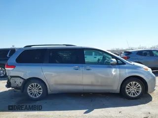 2011 Toyota Sienna XLE AAS with VIN 5TDYK3DCXBS172586, listed as a IAAI auction lot 41835992 with 203,599 mi miles. Bid and sale history available at carsss.com. Image 13.