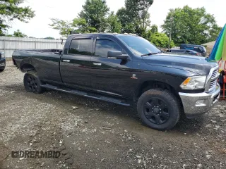 2017 Ram 2500 SLT z VIN 3C6UR5JL4HG721238, wystawiony jako Copart lot #62029205 z przebiegiem 100 187 mil mil oraz Szkoda całkowita • Salvage title. Historia ofert i sprzedaży dostępna na DreamBid. Obrazek 4.