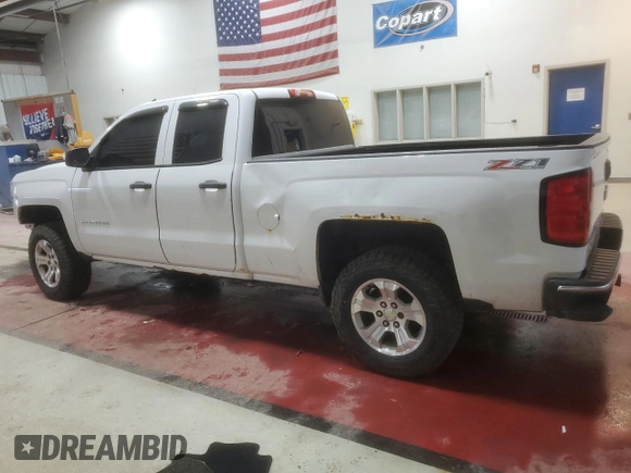 2014 Chevrolet Silverado 1500 LT with VIN 1GCVKREC8EZ413682, listed as a Copart auction lot 50869935 with 140,224 mi miles and Salvage Title. Bid and sale history available at DreamBid. Image 2.