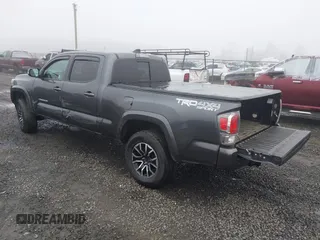 2021 Toyota Tacoma 4WD SR5 with VIN 3TMDZ5BN4MM099423, listed as a IAAI auction lot 41208397 with 62,935 mi miles. Bid and sale history available at carsss.com. Image 3.
