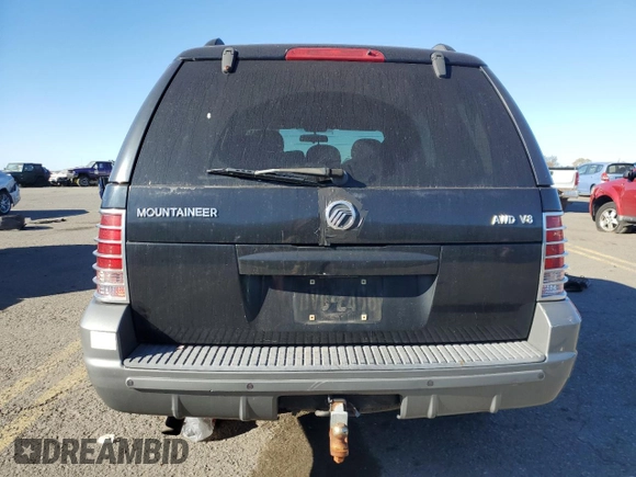 2003 Mercury Mountaineer Convenience z VIN 4M2DU86W23UJ10359, wystawiony jako Copart lot #76490044 z przebiegiem 165 258 mil mil oraz Szkoda całkowita • Salvage title. Historia ofert i sprzedaży dostępna na DreamBid. Obrazek 6.