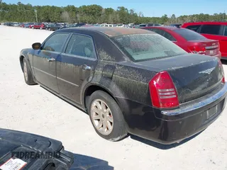 2005 Chrysler 300 with VIN 2C3AA63H75H577363, listed as a IAAI auction lot 41892999 with 229,634 mi miles. Bid and sale history available at carsss.com. Image 3.