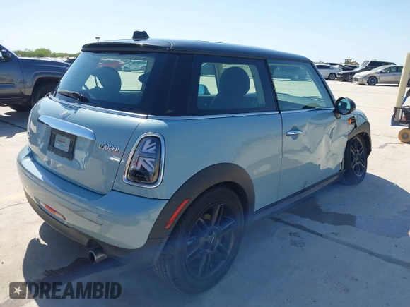 2013 MINI Hardtop with VIN WMWSU3C57DT690398, listed as a IAAI auction lot 41989221 with 112,954 mi miles and . Bid and sale history available at DreamBid. Image 4.