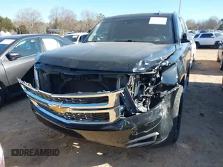 2015 Chevrolet Tahoe LT with VIN 1GNSCBKC5FR156050, listed as a IAAI auction lot 41486815 with 220,599 mi miles and . Bid and sale history available at DreamBid. Image 12.