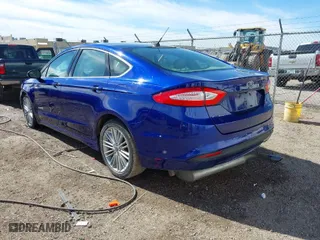 2014 Ford Fusion SE Hybrid with VIN 3FA6P0LU3ER219620, listed as a IAAI auction lot 41560424 with 153,681 mi miles. Bid and sale history available at carsss.com. Image 3.