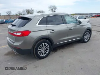 2016 Lincoln MKX Select z VIN 2LMTJ8KR9GBL57397, wystawiony jako IAAI lot #42104585 z przebiegiem 286 562 mil mil oraz . Historia ofert i sprzedaży dostępna na DreamBid. Obrazek 4.