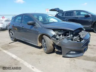 2017 Ford Focus ST with VIN 1FADP3L96HL320657, listed as a IAAI auction lot 42064649 with 129,843 mi miles. Bid and sale history available at carsss.com. Image 1.