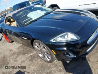 2014 Jaguar XK with VIN SAJWA4GB0ELB52358, listed as a IAAI auction lot 41832850 with 93,037 mi miles. Bid and sale history available at carsss.com. Image 1.