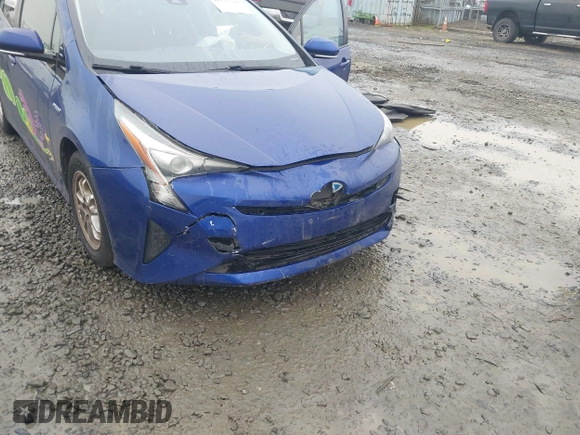 2018 Toyota Prius Two with VIN JTDKBRFU3J3071016, listed as a IAAI auction lot 41335582 with 179,542 mi miles and . Bid and sale history available at DreamBid. Image 6.