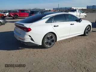 2022 Kia K5 GT-Line z VIN 5XXG64J23NG089623, wystawiony jako IAAI lot #41291422 z przebiegiem 128 273 mil mil oraz . Historia ofert i sprzedaży dostępna na DreamBid. Obrazek 4.