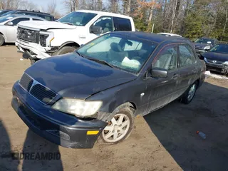 2002 Mitsubishi Lancer LS with VIN JA3AJ36E42U080614, listed as a IAAI auction lot 41397554 with 187,981 mi miles. Bid and sale history available at carsss.com. Image 17.