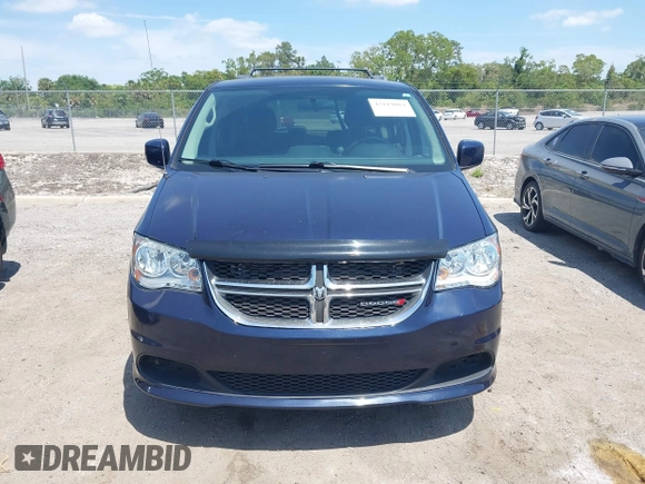 2014 Dodge Grand Caravan SXT with VIN 2C4RDGCG3ER266199, listed as a IAAI auction lot 42119064 with 148,067 mi miles and . Bid and sale history available at DreamBid. Image 13.