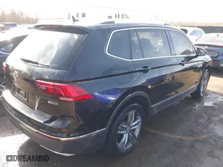 2020 Volkswagen Tiguan SE with VIN 3VV2B7AX5LM116837, listed as a IAAI auction lot 41791864 with 76,623 mi miles. Bid and sale history available at carsss.com. Image 4.