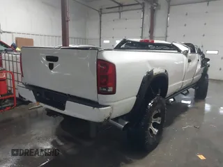 2006 Dodge Ram 3500 SLT with VIN 3D7LX38C36G124573, listed as a IAAI auction lot 41293879 with 187,850 mi miles. Bid and sale history available at carsss.com. Image 4.