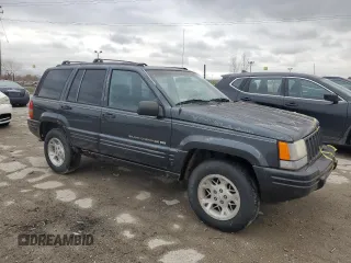 1998 Jeep Grand Cherokee Limited with VIN 1J4GZ78Y7WC163186, listed as a Copart auction lot 75011954 with 247,991 mi miles and Salvage Title. Bid and sale history available at carsss.com. Image 4.