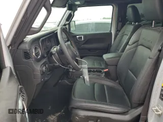 2024 Jeep Wrangler Sahara with VIN 1C4RJXP60RW122620, listed as a Copart auction lot 50622135 with 22,238 mi miles and Salvage Title. Bid and sale history available at DreamBid. Image 7.