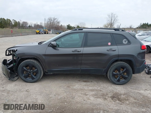 2016 Jeep Cherokee 75th Anniversary with VIN 1C4PJMCB0GW156076, listed as a IAAI auction lot 41946760 with 105,571 mi miles. Bid and sale history available at carsss.com. Image 15.