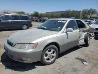 1999 Lexus ES 300 with VIN JT8BF28GXX5072937, listed as a Copart auction lot 60336175 with 107,234 mi miles and Salvage title. Bid and sale history available at DreamBid. Image 1.