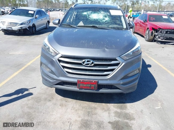 2018 Hyundai Tucson SEL with VIN KM8J3CA48JU718402, listed as a IAAI auction lot 41810363 with 218,853 mi miles. Bid and sale history available at carsss.com. Image 12.