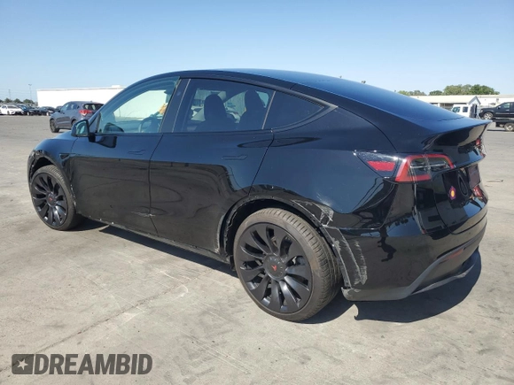 2023 Tesla Model Y Long Range z VIN 7SAYGAEE7PF859030, wystawiony jako Copart lot #58965185 z przebiegiem 18 421 mil mil oraz Czysty tytuł • Clean title. Historia ofert i sprzedaży dostępna na DreamBid. Obrazek 2.