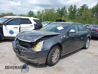 2012 Cadillac CTS z VIN 1G6DC5E54C0114309, wystawiony jako IAAI lot #42256621 z przebiegiem 148 698 mil mil oraz . Historia ofert i sprzedaży dostępna na DreamBid. Obrazek 2.