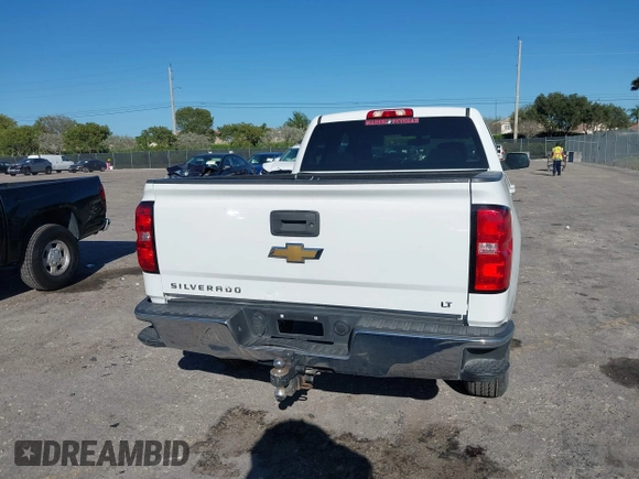 2018 Chevrolet Silverado 1500 LT with VIN 1GCRCREC1JZ153165, listed as a IAAI auction lot 41737258 with 130,475 mi miles and . Bid and sale history available at DreamBid. Image 17.