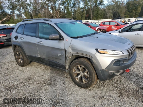 2014 Jeep Cherokee Trailhawk with VIN 1C4PJMBB3EW158869, listed as a Copart auction lot 42860515 with 135,172 mi miles and Non repairable. Bid and sale history available at DreamBid. Image 4.