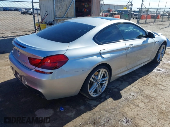 2014 BMW 6 Series 650i with VIN WBAYM9C57ED248195, listed as a IAAI auction lot 41231716 with Not Provided miles and . Bid and sale history available at carsss.com. Image 4.