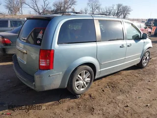 2010 Chrysler Town & Country Limited with VIN 2A4RR6DX9AR153422, listed as a IAAI auction lot 41686509 with 237,868 mi miles. Bid and sale history available at carsss.com. Image 4.