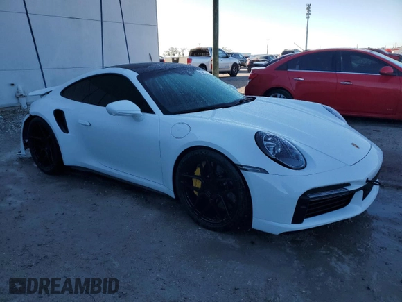 2021 Porsche 911 Turbo S with VIN WP0AD2A98MS257662, listed as a Copart auction lot 83297714 with 72,267 mi miles and Salvage Title. Bid and sale history available at carsss.com. Image 4.