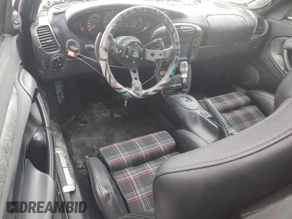 1999 Porsche 911 z VIN WP0AA299XXS623462, wystawiony jako Copart lot #85549554 z przebiegiem Nie podano mil oraz Szkoda całkowita • Salvage title. Historia ofert i sprzedaży dostępna na DreamBid. Obrazek 8.