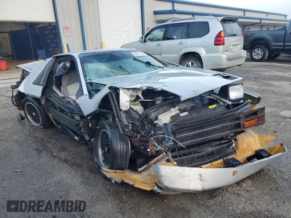 1985 Pontiac Fiero z VIN 1G2PF3795FP228812, wystawiony jako Copart lot #84717324 z przebiegiem 173 310 mil mil oraz Nie do naprawy • Non repairable. Historia ofert i sprzedaży dostępna na DreamBid. Obrazek 4.