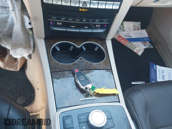 2015 Mercedes-Benz E-Class E 400 with VIN WDDKJ6FB3FF303383, listed as a IAAI auction lot 41818692 with 62,839 mi miles. Bid and sale history available at carsss.com. Image 11.