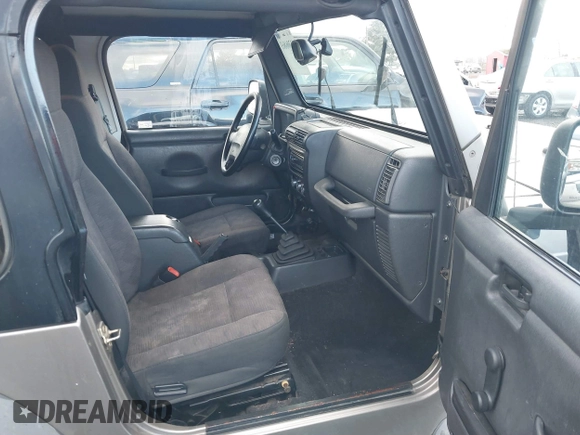 2004 Jeep Wrangler Sport with VIN 1J4FA49S94P711531, listed as a IAAI auction lot 41306863 with 143,720 mi miles and . Bid and sale history available at DreamBid. Image 5.
