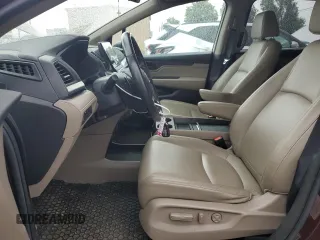 2019 Honda Odyssey EX-L z VIN 5FNRL6H70KB129539, wystawiony jako Copart lot #58477675 z przebiegiem 145 738 mil mil oraz Szkody całkowita. Historia ofert i sprzedaży dostępna na DreamBid. Obrazek 7.